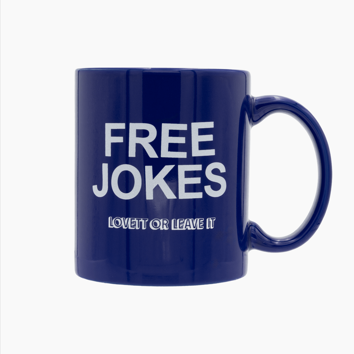 Blue mug with white text 'FREE JOKES LOVE IT OR LEAVE IT' on a white background