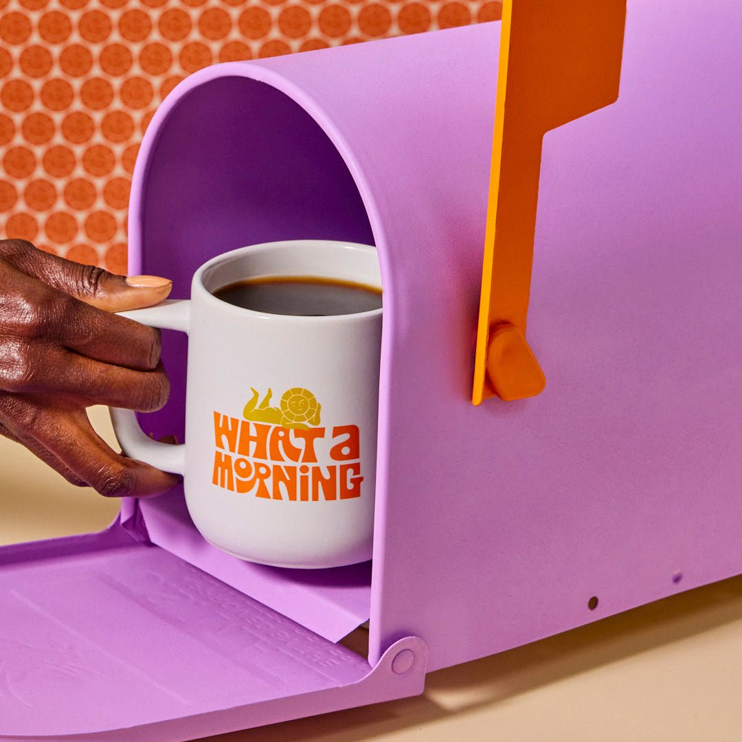 What a Morning Coffee mug being put in a mailbox
