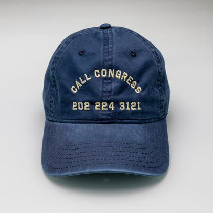 Blue cap with 'Call Congress' and phone number on a white background