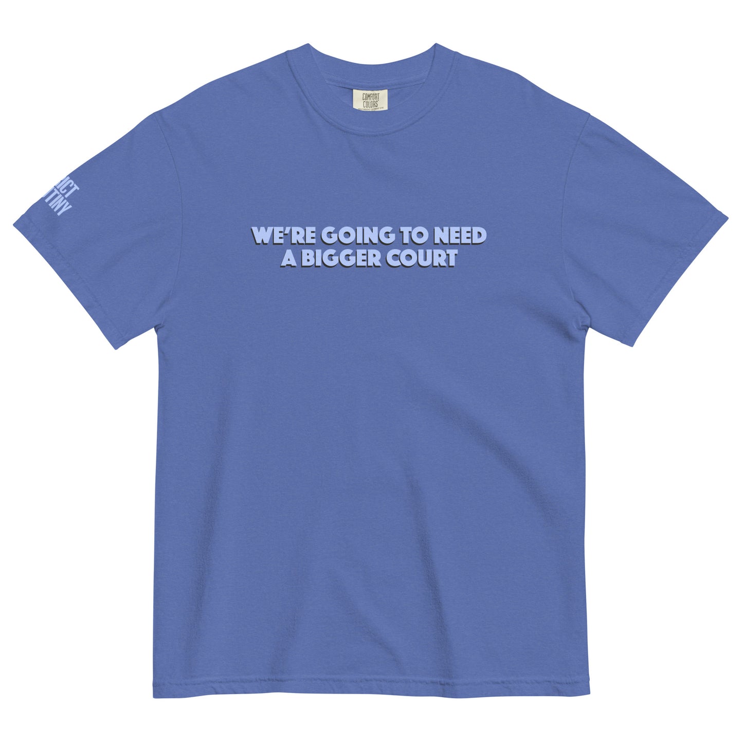 A blue short-sleeve crewneck t-shirt with the text 'WE'RE GOING TO NEED A BIGGER COURT' printed in light blue white across the chest