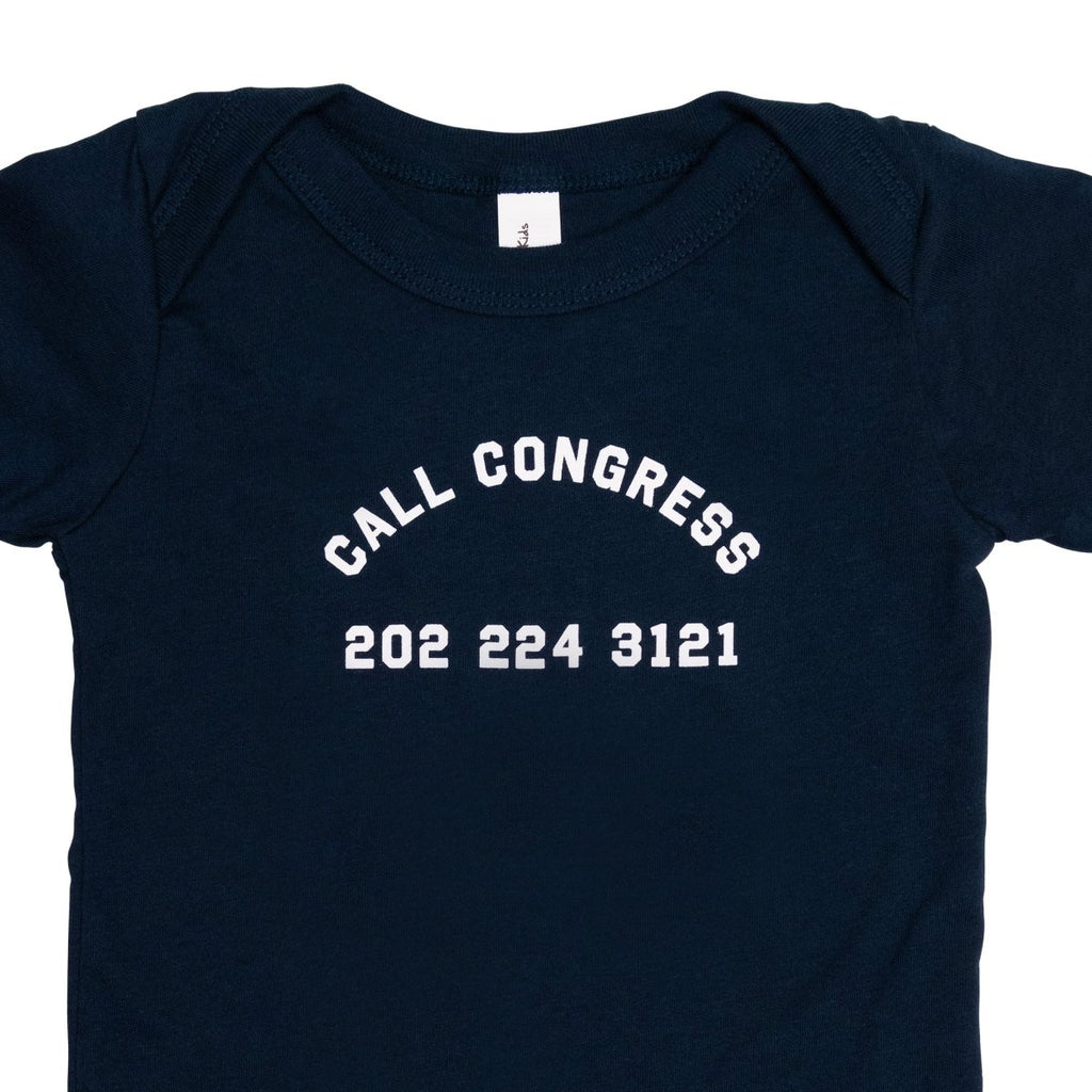 Crooked Call Congress Baby Navy Onesie Close Up Logo