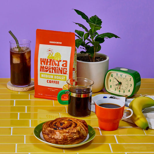 What a Morning Medium Roast Coffee bag surrounded by miscellaneous breakfast foods 
